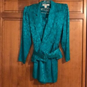 Two piece silk suit with belt.